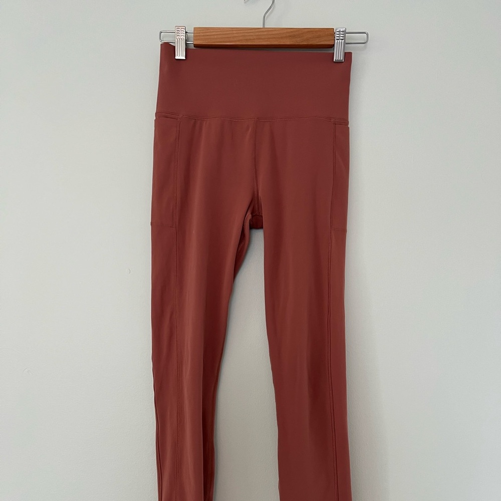 Vuori Studio Pocket Legging in Cinnamon Orange